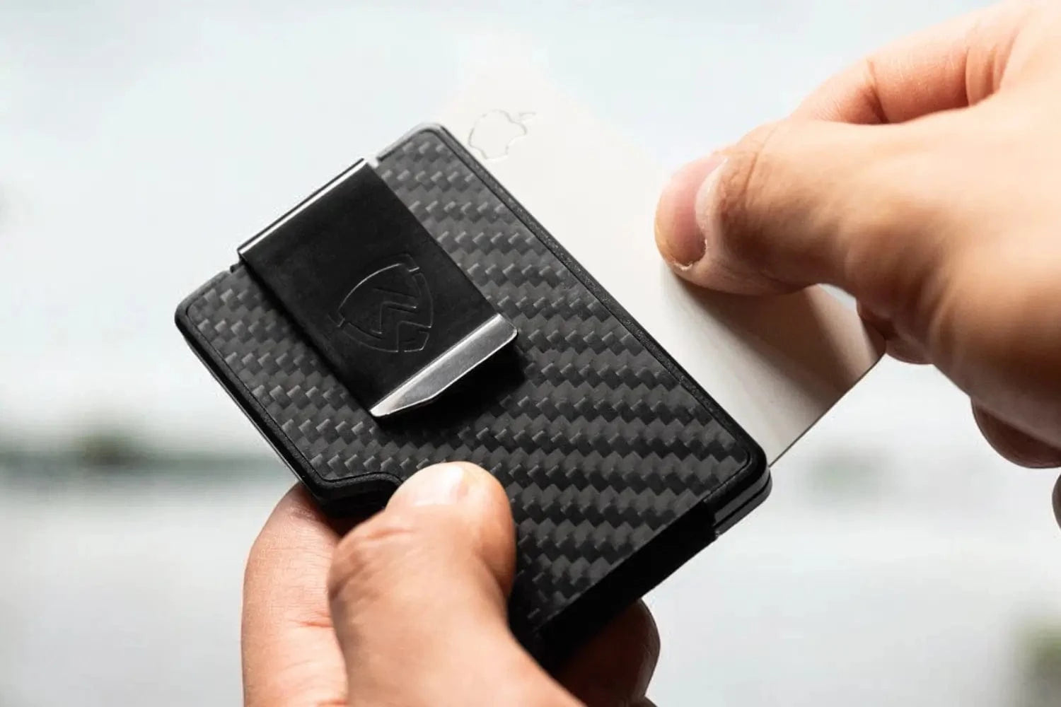 Jet black carbon fiber Axwell wallet background